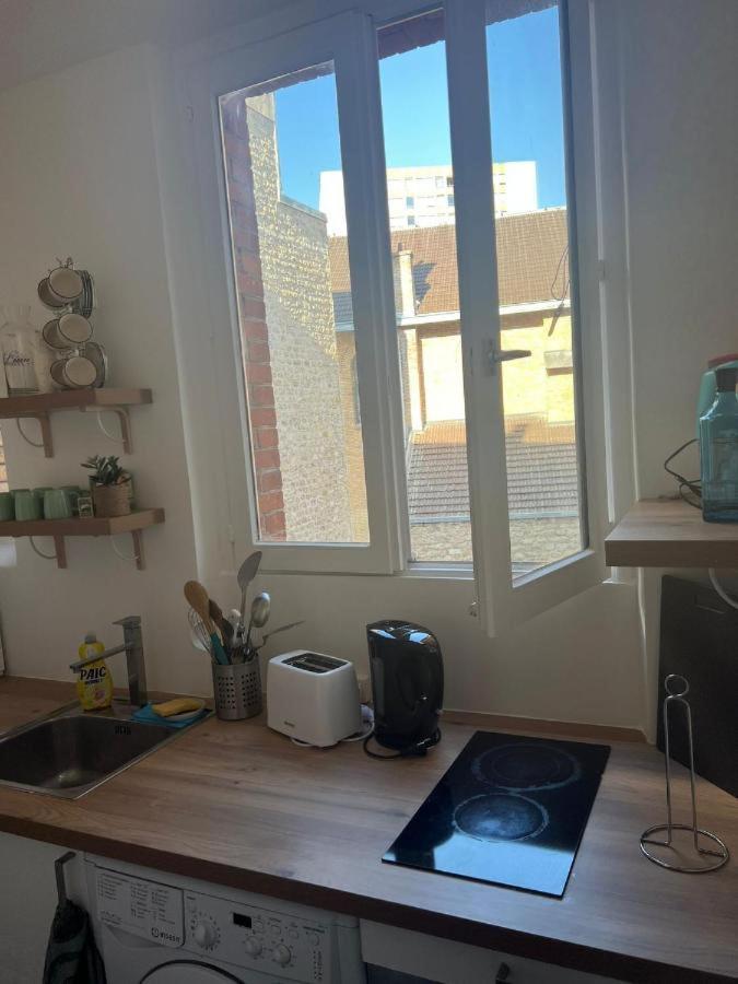 Appartamento Cosy Haven Paris 14 Esterno foto